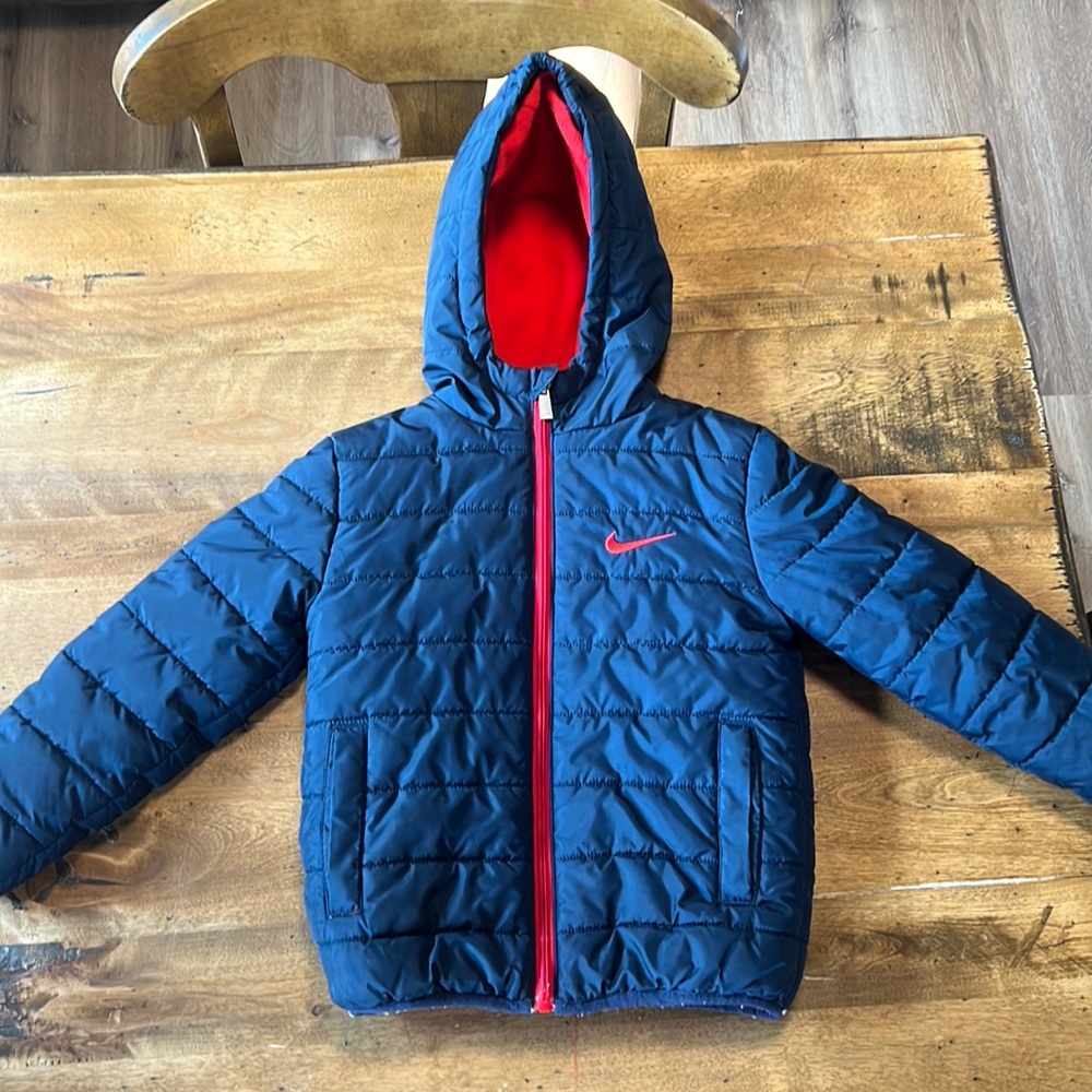 Boys size 5 nike down jacket. Good condition. Clean. Non-smoking home.